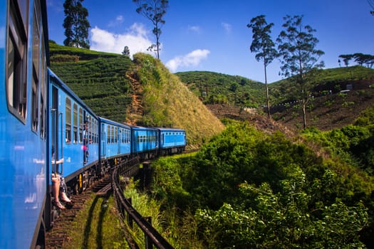 train from Nuwara Eliya to Kandy among tea plantations in the highlands of Sri Lanka