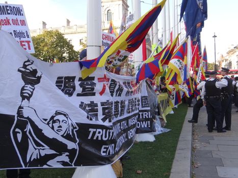 UK, London: Dozens of pro-Tibet protesters rally outside Parliament in London, England on October 20, 2015, as Chinese President Xi Jinping arrives for his address during his four-day visit. Since China's invasion of their country in 1950, Tibetans have never stopped resisting the occupation, and claiming the destruction of their way of life.