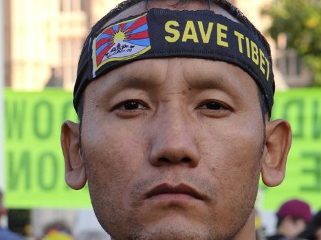 UK, London: A pro-Tibet protester rallies with dozens of others outside Parliament in London, England on October 20, 2015, as Chinese President Xi Jinping arrives for his address during his four-day visit. Since China's invasion of their country in 1950, Tibetans have never stopped resisting the occupation, and claiming the destruction of their way of life.