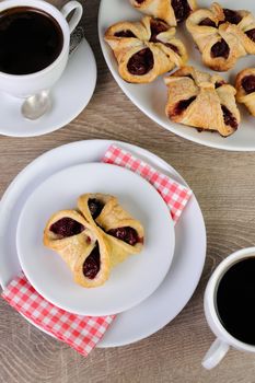 Bun puff pastry stuffed with cherries