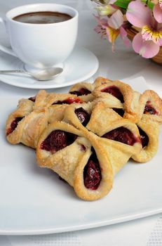 Bun puff pastry stuffed with cherries