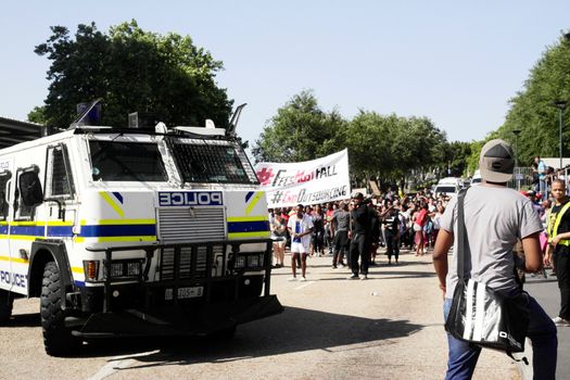 SOUTH AFRICA, Cape Town : Students rally during a protest against fee hikes at the University of Cape Town on October 20, 2015. Student protests halted teaching at three of South Africa's top universities on October 19 as demonstrations spread against fee increases that many say will force poor black students further out of the education system