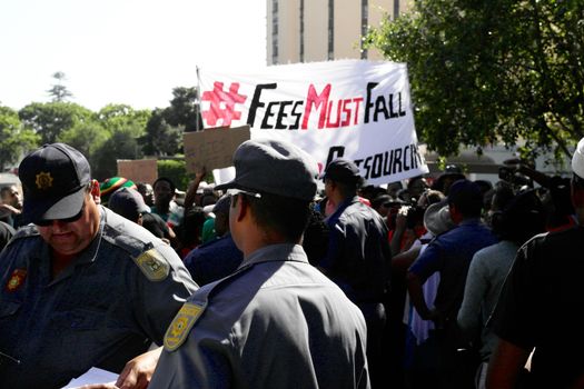 SOUTH AFRICA, Cape Town : Students rally during a protest against fee hikes at the University of Cape Town on October 20, 2015. Student protests halted teaching at three of South Africa's top universities on October 19 as demonstrations spread against fee increases that many say will force poor black students further out of the education system