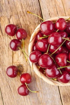 fresh cherries on wooden table