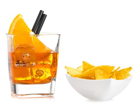 hot tacos chips in front of glass of spritz aperitif aperol cocktail with orange slices and ice cubes on white background