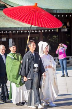 HARAJUKU,TOKYO – NOVEMBER 21: Japanese wedding Celebration of a typical wedding ceremony on NOVEMBER 21,2014 in Meiji Jingu Shrine Harajuku Tokyo, Japan.