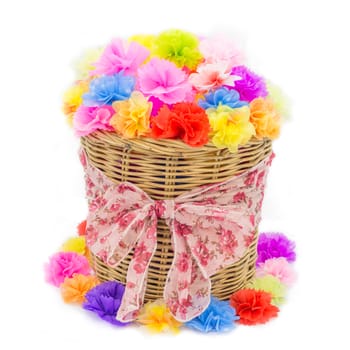Bright flowers in basket isolated on white
