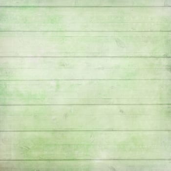 Rustic old plank background in green, mint and beige colors with textured scratches and antique cracked paint for scrapbooking and decoupage