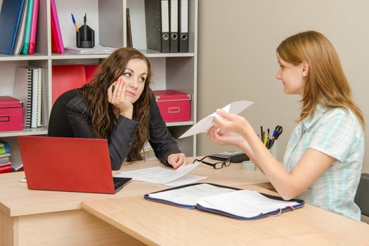 Young beautiful girl on reception at the office specialist