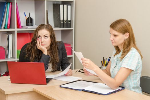 Young beautiful girl on reception at the office specialist
