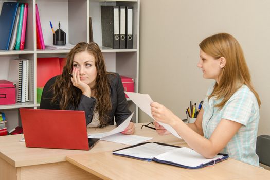 Young beautiful girl on reception at the office specialist