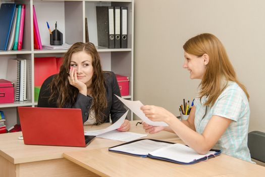 Young beautiful girl on reception at the office specialist