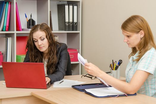 Young beautiful girl on reception at the office specialist