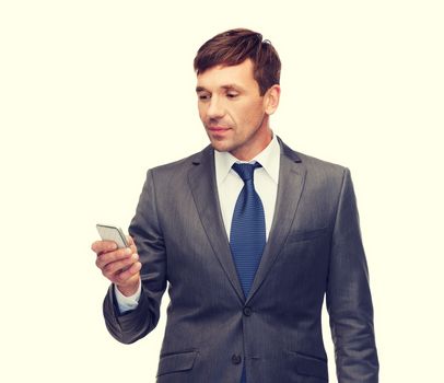 business, communication, modern technology and office concept - buisnessman with smartphone