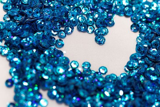 Close up photo lots of blue sequin