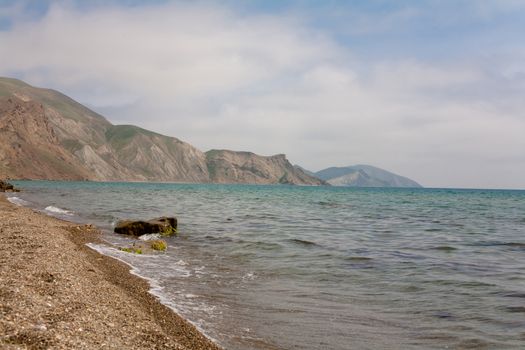 Grey mountains and blue sea in Crimea
