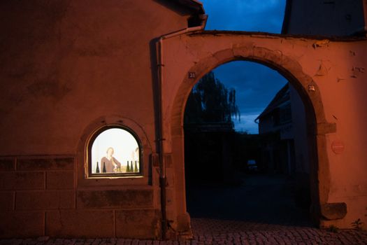 Romantic lights on night streets in Alsace, France