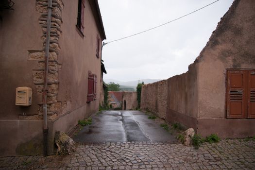 mittelbergheim town streets in alsace during a rain