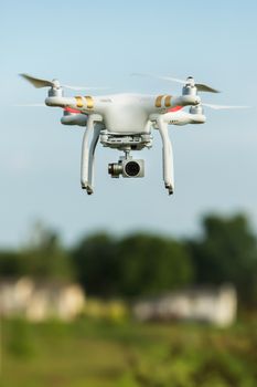Single surveillance drone flying in sky outdoors