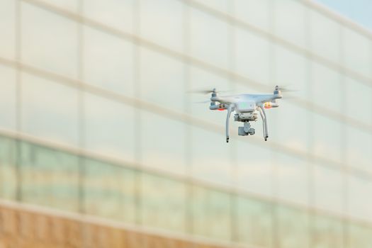 Single remote control drone flying in mid air