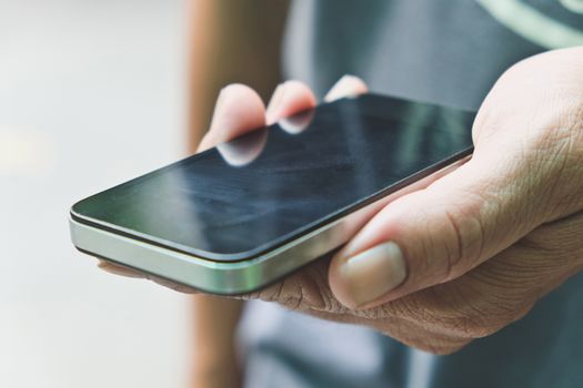 Close up of Man Hand holding Smart Phone