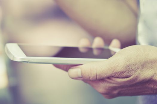 Close up of Man Hand holding Smart Phone