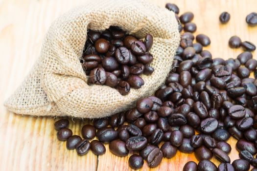 Coffee beans in burlap sack.