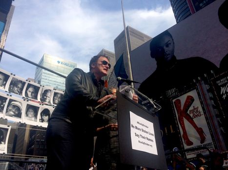 USA, New York: Hollywood director Quentin Tarantino speaks to the crowd during the #RiseUpOctober rally in Times Square, New York City on October 22, 2015. He joins activists and relatives of those who have died as a result of police violence in the United States as they told stories of those they had lost. The three-day #RiseUpOctober protest culminates on October 24 with a mass rally at Washington Square Park at 11am, and a march to Columbus Circle at 1pm, which thousands are expected to attend.