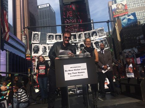 USA, New York: Hollywood director Quentin Tarantino speaks to the crowd during the #RiseUpOctober rally in Times Square, New York City on October 22, 2015. He joins activists and relatives of those who have died as a result of police violence in the United States as they told stories of those they had lost. The three-day #RiseUpOctober protest culminates on October 24 with a mass rally at Washington Square Park at 11am, and a march to Columbus Circle at 1pm, which thousands are expected to attend.