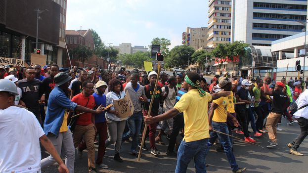 SOUTH AFRICA, Johannesburg: Thousands of students from two universities marched to the ANC head office in Johannesburg on October 22, 2015 in protest over proposed fee rises. They began at their respective campuses at University of Witwatersrand and the University of Johannesburg to give Gwede Mantashe, the Secretary General of the African National Congress a memorandum in which they asked for free quality education for all.