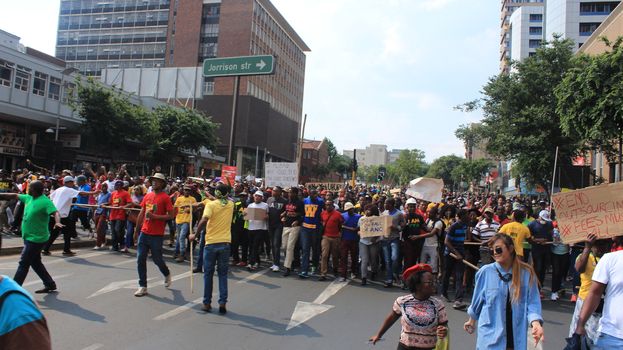 SOUTH AFRICA, Johannesburg: Thousands of students from two universities marched to the ANC head office in Johannesburg on October 22, 2015 in protest over proposed fee rises. They began at their respective campuses at University of Witwatersrand and the University of Johannesburg to give Gwede Mantashe, the Secretary General of the African National Congress a memorandum in which they asked for free quality education for all.