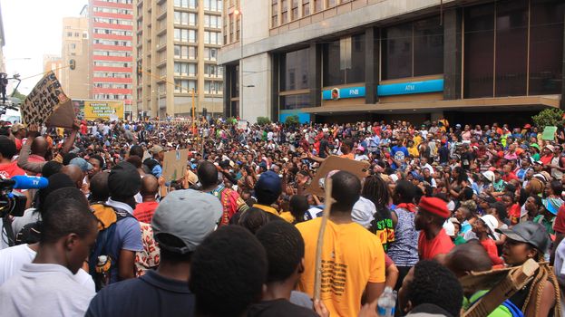 SOUTH AFRICA, Johannesburg: Thousands of students from two universities marched to the ANC head office in Johannesburg on October 22, 2015 in protest over proposed fee rises. They began at their respective campuses at University of Witwatersrand and the University of Johannesburg to give Gwede Mantashe, the Secretary General of the African National Congress a memorandum in which they asked for free quality education for all.
