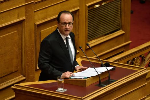 GREECE, Athens: French President Francois Hollande delivers a speech during the plenary session of the Greek Parliament, on the second day of his visit to Athens, on October 23, 2015.