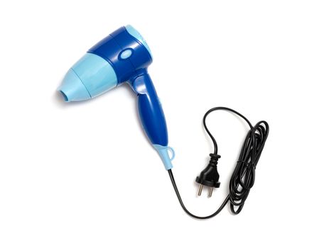 a travel hairdryer isolated on a white background