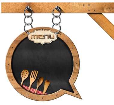 Empty blackboard with frame in the shape of a speech bubble with wooden kitchen utensils. Template for a restaurant menu