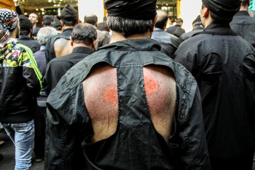 IRAN, Tehran: Iraqis living in Iran gathered to mourn in front of the Grand Bazaar in Tehran, Iran on October 23, 2015.Worshipers in these photos celebrate the Ashura, or tenth day of Muharram. Muharram is the first month in the Islamic calendar and the Ashura marks the day that the grandson of the Prophet Mohammad's grandson, Imam Hussein, was killed. 