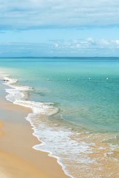 View from Tangalooma Island beach during the day with an overcast sky