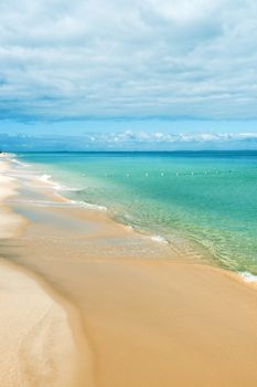 View from Tangalooma Island beach during the day with an overcast sky