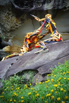 BONDI, AUSTRALIA - OCTOBER 22, 2015;  Annual Sculpture by the Sea free public event.  Exhibit titled Cradle of Form by Elyssa Sykes-Smith, challenging our will to dominate nature and our need to depend on it.