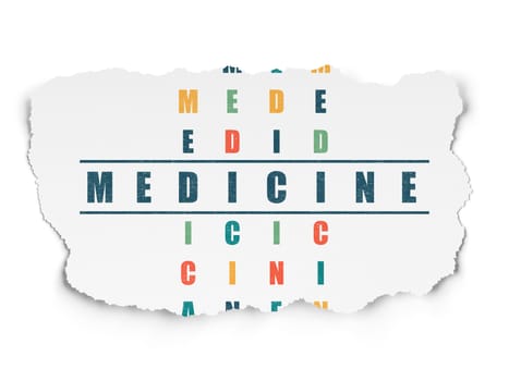 Health concept: Painted blue word Medicine in solving Crossword Puzzle on Torn Paper background
