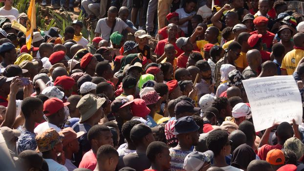 SOUTH AFRICA, Pretoria: Demonstrators run from police as an estimated 10,000 people gather at the Union Buildings on October 23, 2015.  The protesters demand that proposed tuition fee rises be scrapped, and called for the president, Jacob Zuma, to personally address their concerns.  It was the largest student protest since the 1976 Soweto uprising, a significant moment in the fight against South Africa's apartheid regime. 