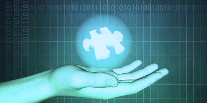 Hand Holding Jigsaw Piece as a Business Concept