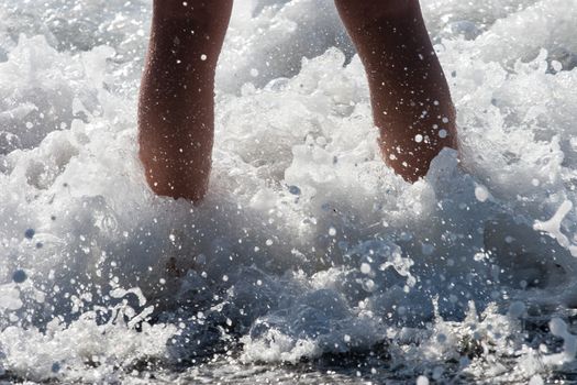 Ocean Waves Splashing Over Child's feet at the beach







Ocean splashing over childs feet