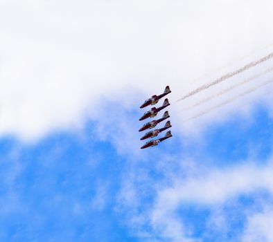 SPRINGBANK CANADA - JUL 20, 2015: The Snowbirds Demonstration Team demonstrate the skill, professionalism, and teamwork of Canadian Forces personnel during the Wings Over Lethbridge..