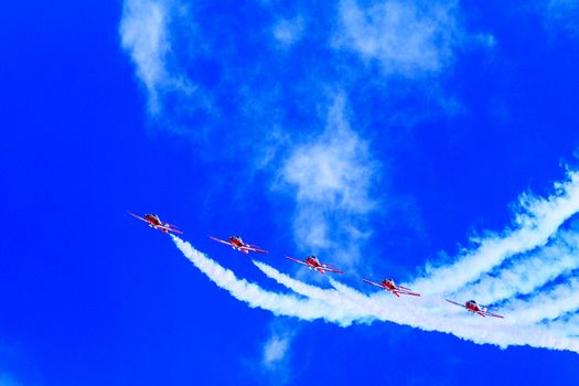 SPRINGBANK CANADA - JUL 20, 2015: The Snowbirds Demonstration Team demonstrate the skill, professionalism, and teamwork of Canadian Forces personnel during the Wings Over Lethbridge..