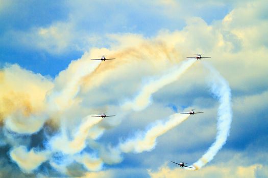 SPRINGBANK CANADA - JUL 20, 2015: The Snowbirds Demonstration Team demonstrate the skill, professionalism, and teamwork of Canadian Forces personnel during the Wings Over Lethbridge..