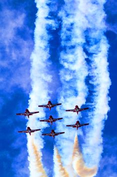 SPRINGBANK CANADA - JUL 20, 2015: The Snowbirds Demonstration Team demonstrate the skill, professionalism, and teamwork of Canadian Forces personnel during the Wings Over Lethbridge..