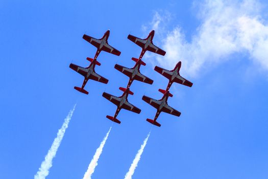 SPRINGBANK CANADA - JUL 20, 2015: The Snowbirds Demonstration Team demonstrate the skill, professionalism, and teamwork of Canadian Forces personnel during the Wings Over Lethbridge..