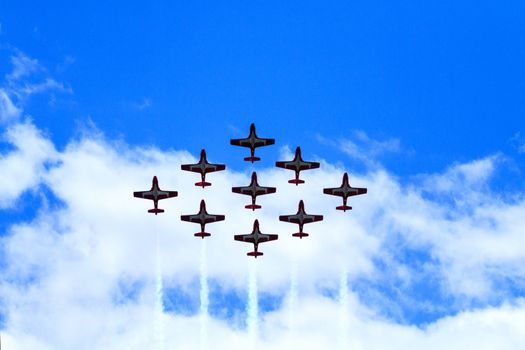 SPRINGBANK CANADA - JUL 20, 2015: The Snowbirds Demonstration Team demonstrate the skill, professionalism, and teamwork of Canadian Forces personnel during the Wings Over Lethbridge.