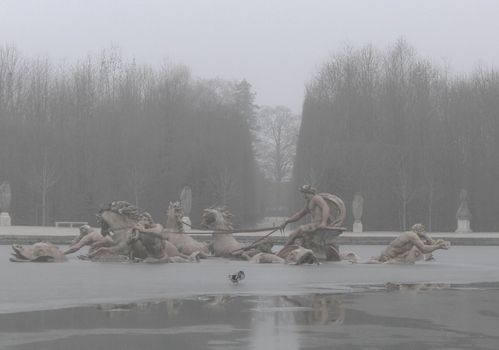 Fountain in the park, morning-fog, Château de Versailles, Paris.